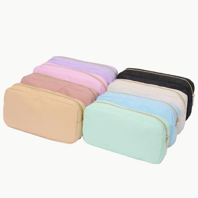 China Fashion Nylon Cosmetic Bag Customized Stock Multi Color DIY Patches Toiletry Bag Brides Gift Personalized Makeup Bag for sale