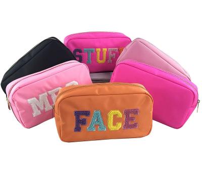 China Bright Color Make Up Bag New Nylon Toiletry Bag Lady Towel Durable Embroidery Bright Colorful Letter Make Up Cosmetic Box Large Capacity Bag for sale