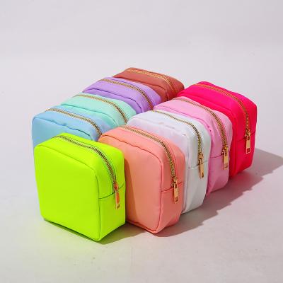 China New Fashion Candy Color Nylon Running Pouch Cosmetic Bag Can Be Customized Neon Make Up Bag With Chenille Letter Patches for sale