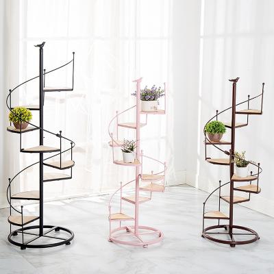 China Europe Multilayer Spiral Shape Outdoor Wrought Iron Flower Stand Garden Metal Stair Plant Stand for sale