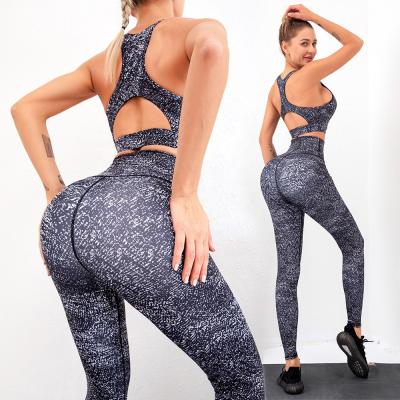 China Breathable Plus Fitness Wear 2021 Women's Outer Two-Piece Bras And Leggings Yoga Crac! crack! Zize Unique Butt Sets Fitness Gym for sale