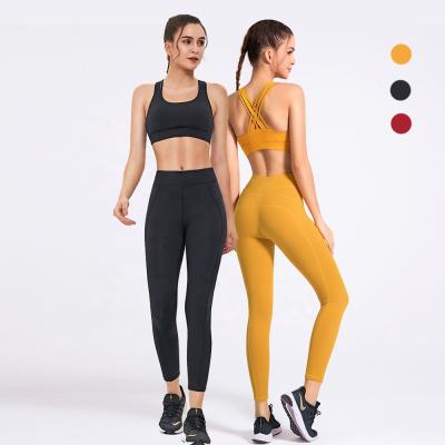 China Wholesale Custom Breathable Logo Cross Back Jogging Sports Bra Tops And Pants 2 Piece Women Fashion Design Yoga Set for sale