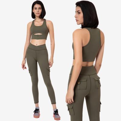 China Wholesale Breathable Women Activewear V Belt 4 Pockets Gaiters 2 Pieces Set Fitness Yoga Zipper Sports Bra Sets for sale