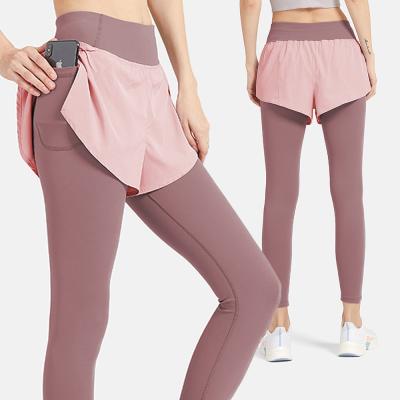 China Wholesale Breathable Two Piece Fake Belly Yoga Pants Order Slimming Active Booty Fitness Wear Gaiters For Women With Pockets for sale