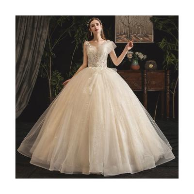 China Temperament anti-static European lace America style train wedding dress crystal detachable champagne color for sale