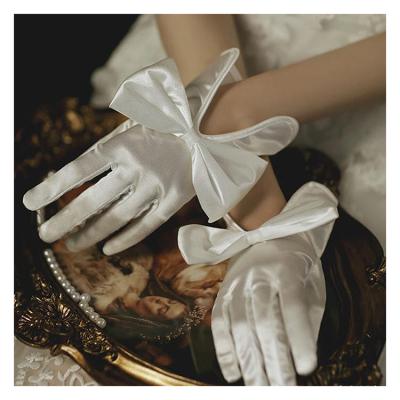 China Satin Bridal Bridal Girl Wedding Dress Gloves Butterfly Wedding Wrist Length New Wedding Gloves for sale