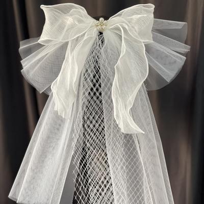 China Lace Edge Latest Elegant Mesh Pearl Double Layer Bridal Bow Wedding Veil With Pearls for sale