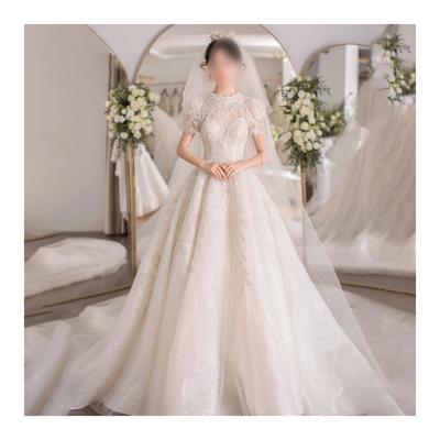 China Shaoxing Crystal Big Tail Romantic Palace Style Wedding Dress Anti-static Factory Embroidered Export for sale