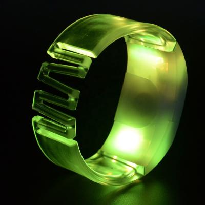 China Customized flashing remote control wristband waterproof/waterproof remote control rfid wristband wedding party LED event for sale