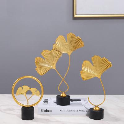 China Nordic Creative Gold Pattern Luxury Decoration Bedroom European Ginkgo Leaf Cabinet Porch Home Decoration Modern TV Light for sale