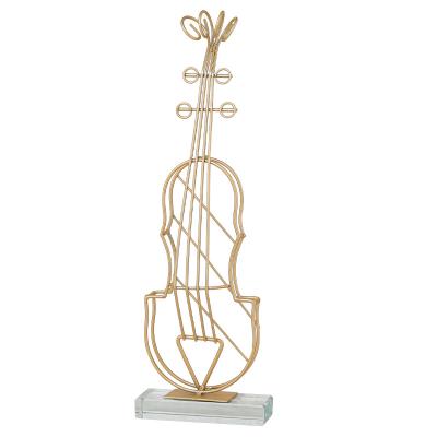 China Eco-friendly Modern Gold Bedroom Violin Decoration Home Accessories Ornament For Living Room Gold Iron Shape Opens Office Decor for sale