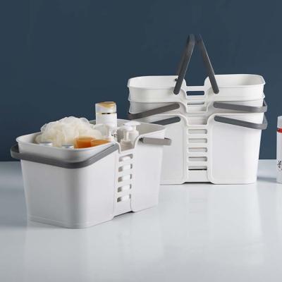 China Sustainable Portable Bathroom Basket Bathroom Plastic Storage Boxed Kitchen Bath Storage Basket for sale