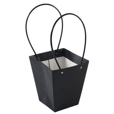 China Popular Recycled Materials Kraft Black Luxury Paper Bags With PVC Handle Custom Logo Waterproof Flower Paper Gift Bag for sale