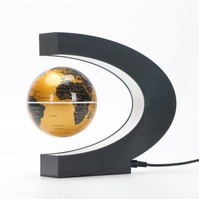 China Floating In Air Rontion Decorative Rotating Light World Globe With Wooden Base for sale