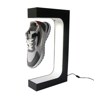 China 2022 Newest Acrylic Magnetic Levitating Rotating Shoe Display Sneaker Acrylic Floating Rack For Advertising Show Display In Store for sale