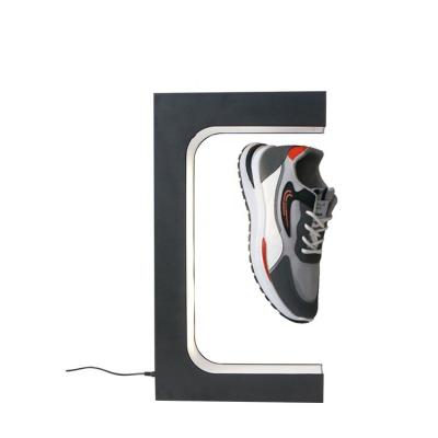 China New Version Acrylic Magnetic Floating Shoes Display Rack Retail Revolving Rack Shelves For Shoe Collectors Shoe Store Shop Display for sale