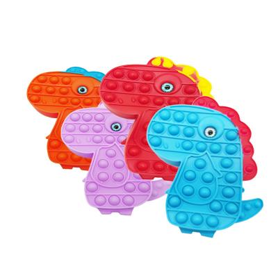 China Mini Decompression Dinosaur Shape Push Bubbles To Release Pressure Fingertips Squeeze Toys Coin Purse Silicon Wallet Silicon Pouch for sale