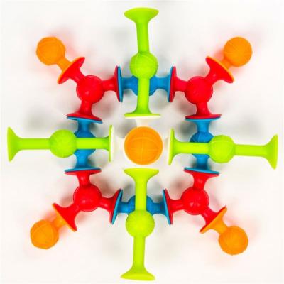 China Bulk Puzzle Kids DIY Adhesion Push Building Puzzle Noise Toy Set Silicone Moving Person Toy for sale