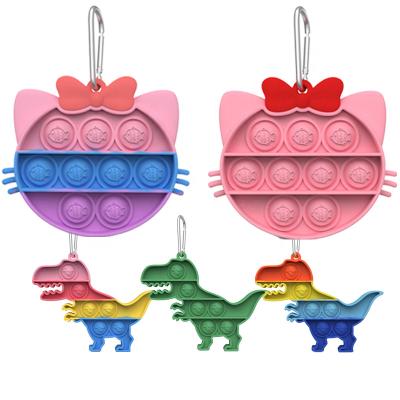 China Portable/Eco-friendly/Waterproof Wholesale Multicolor Dinosaurs And Kitty Push Pop Silicone Key Chain Fingertip Press Cute Key Chain Relaxation Other Key Chains for sale