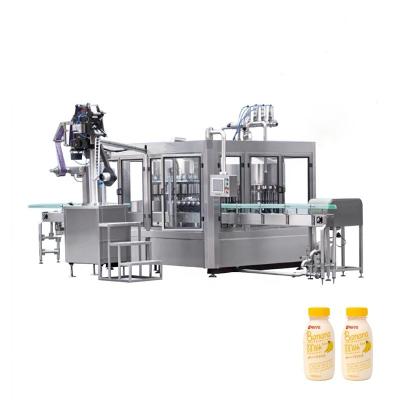 China Beverage Machine Milk Rotary Sealing Filling Machine PP Bottle Milk Filling for sale