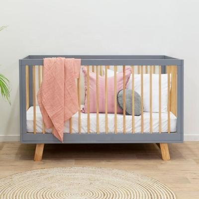 China Eco - Friendly Materials Height Adjustable Wooden Baby Cribs For Newborn Baby for sale