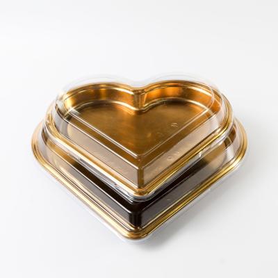 China Cajas de chocolate en forma de corazón de plástico Contenedores para fresas de sushi al por mayor impresa Caja de plástico en forma de corazón en venta