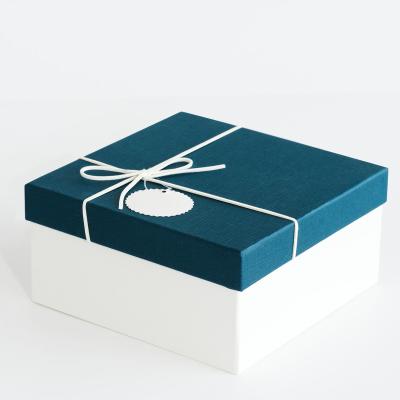 China Biodegradable gift box 30x20x10 die cut white seed paper packaging box. for sale