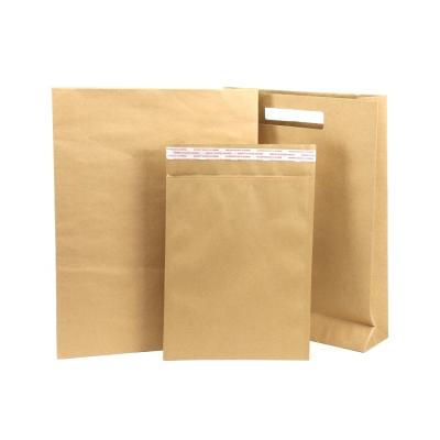 China Garment / Shoes Custom Flat Bottom Stand Up Pouch Kraft Paper Envelope Mailing Bag For Clothing for sale