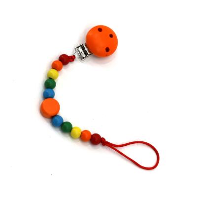 China BPA Free EN 12586 Test Beads Holder Colorful Wooden Baby Pacifier Clip for sale