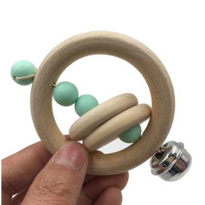 China Safety and Chewable Teether Handle Wooden Bells Jingle Shaker Kids Musical Toys Baby Rattle Toys for sale