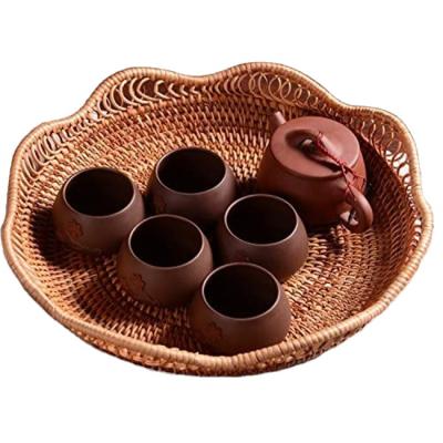 China 2021 Handmade Woven Tea Trays Serving Trays Sustainable Design Eco Friendly Storage Round Decorative Basket Tray for sale