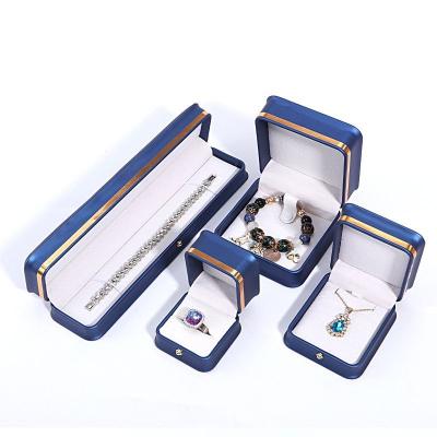 China Wholesale New Design Jewelry Packaging Box Luxury PU Leather Jewelry Boxes With Gold Frame Customized High Quality Jewelry Box for sale