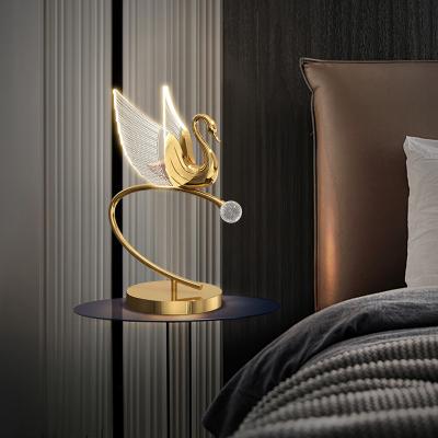 China Factory direct sales gold swan villa bedroom villa luxury aluminum acrylic bedside modern lamp for sale