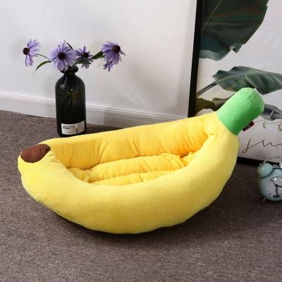 China Banana Shape Dog and Cat Bed House Soft Plush Soft Cushion Basket Kennel Warm Cats for sale