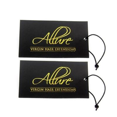 China Viable Personalized Gold Foil Embossed Custom Tags Printing UV Hang Tag Shirt Tags For Name Clothes for sale