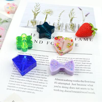 China Various Viable Popular Crystal Stars Flowers Epoxy Resin Straw Buckle Crafting DIY Silicone Mold for sale