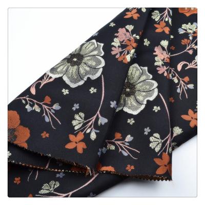 China Tear-resistant polyester metallic floral jacquard yarn dyed women fabric for dress wedding bag luxury toy for sale