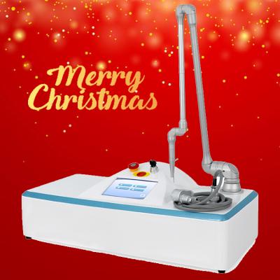 China Anti-puffiness 2022 portable freckle removal machine co2 removal product partial warts removal machine laser machine skin resurfacing for sale