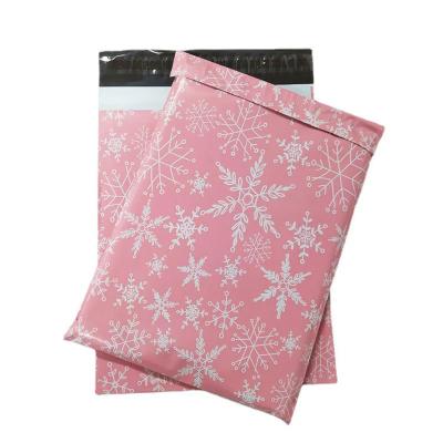 China 100pcs Eco-friendly Pink Snowflake / Factory Folding Printed LOGO Express Bag Plastic Logistics Messenger Packing Bag Clothing Gifts Boxes Shipping Bags for sale