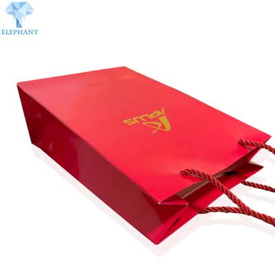 China OEM Logo Kraft Paper Shopping Bags With Handles Bulk Matt Varnish for sale