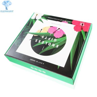 China Custom Design Printing Logo Color Flat Pack Foldable Corrugated Garment Packaging Mailer Boxes for sale