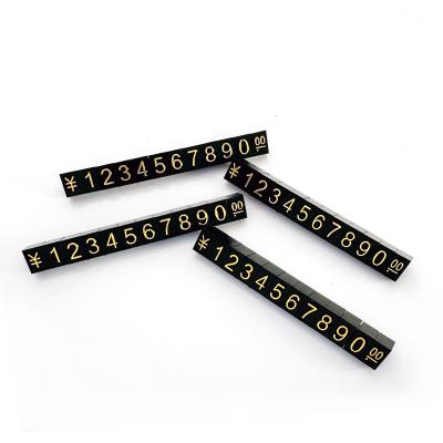 China L9*6mm 100set jewellery display price digital cube  Gold letters Black Background For Retail Shop display customizable for sale