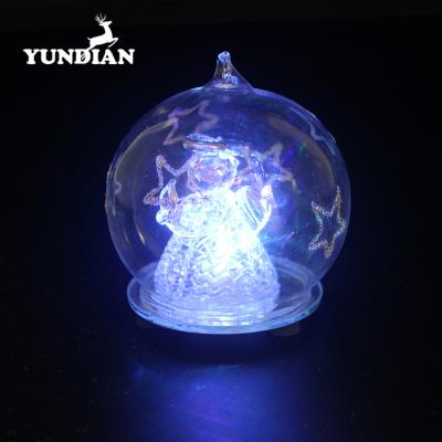 China Christmas Decorations Battery Power Supply Clear Glass Decorative Lighted Christmas Ball With Angel Inside for sale