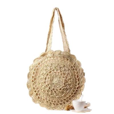 China High Quality Factory Summer Beach Cavity Round Bags Straw Lace Paper Rope Strap Shopping Shoulder Bag For Women for sale