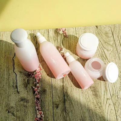 China Serum Pink Color Skin Care Cosmetic Lotion Pump Glass Bottle 30ml 100ml 120ml for sale