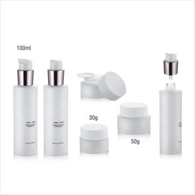 China Personal Care/Flat Shoulder Lotion Pump Bottle Perfume White Color With Cosmetic Jar Set With Plastic Caps 30/50/100ml for sale