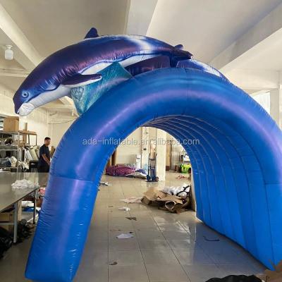 China Customized PVC Coating Fabric Ocean Blue Size Dolphin Inflatable Tunnel For Ocean Theme Park Advertising ST1443 for sale