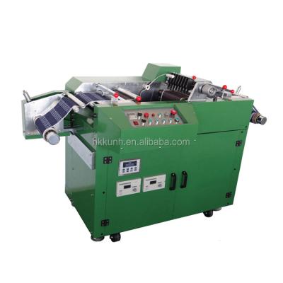 China 450mm ultrasonic automatic high speed label cutting sealed edge fabric label slitting machine for sale