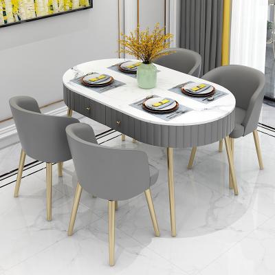 China Nordic light luxury small luxury dining table family marble dining table chair simple combination small for sale