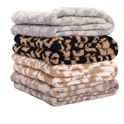 China Wholesale Softest Barefoot Jacquard Knitted Blanket Soft Winter Fleece Leopard Blanket Plush Sofa Nap Blanket for sale